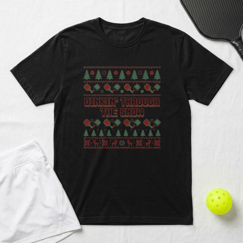 Black t-shirt with "Dinkin' Through the Snow" and holiday pickleball graphics.