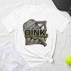 White t-shirt with "DINKL." graphic, pickleball paddle, and skirt.