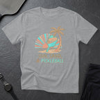 Gray t-shirt with "Sun, Sand, & Pickleball" text and a beach scene.
