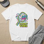 White t-shirt with "COURT VIBES" text and pickleball paddle graphic.