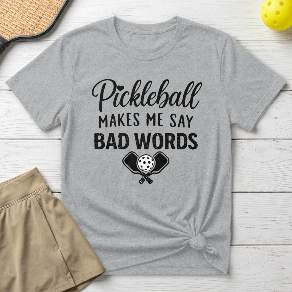 Grey t-shirt with "Pickleball Makes Me Say Bad Words" text and paddles.