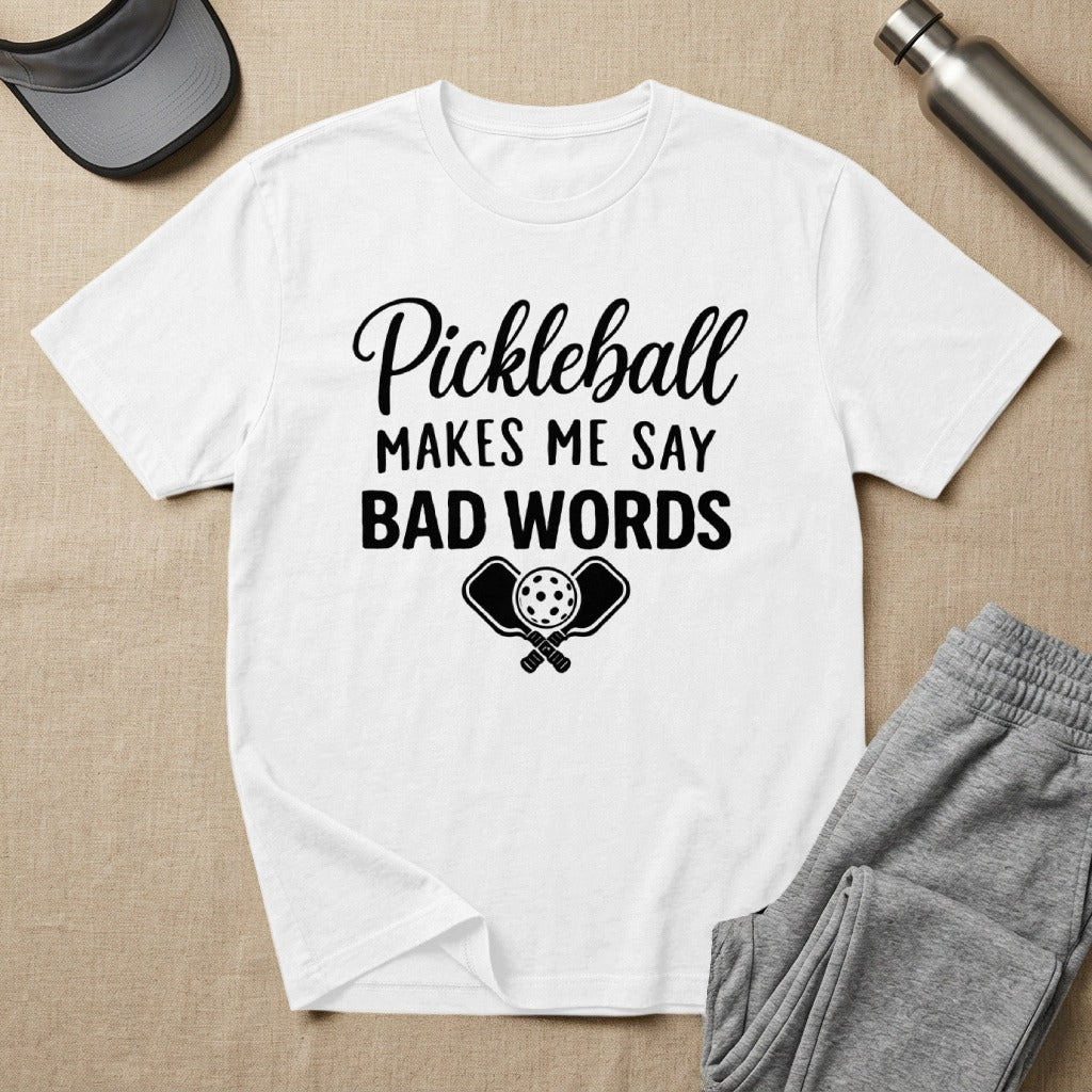 White t-shirt with "Pickleball Makes Me Say Bad Words" text and graphic.