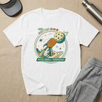 White t-shirt with "VISIT SECTOR 0-0-2 PICKLEBALL PARADISE!" and pickleball graphic.