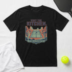 Black t-shirt with "Visit the Kitchen. Travel & Exploration" pickleball graphic.