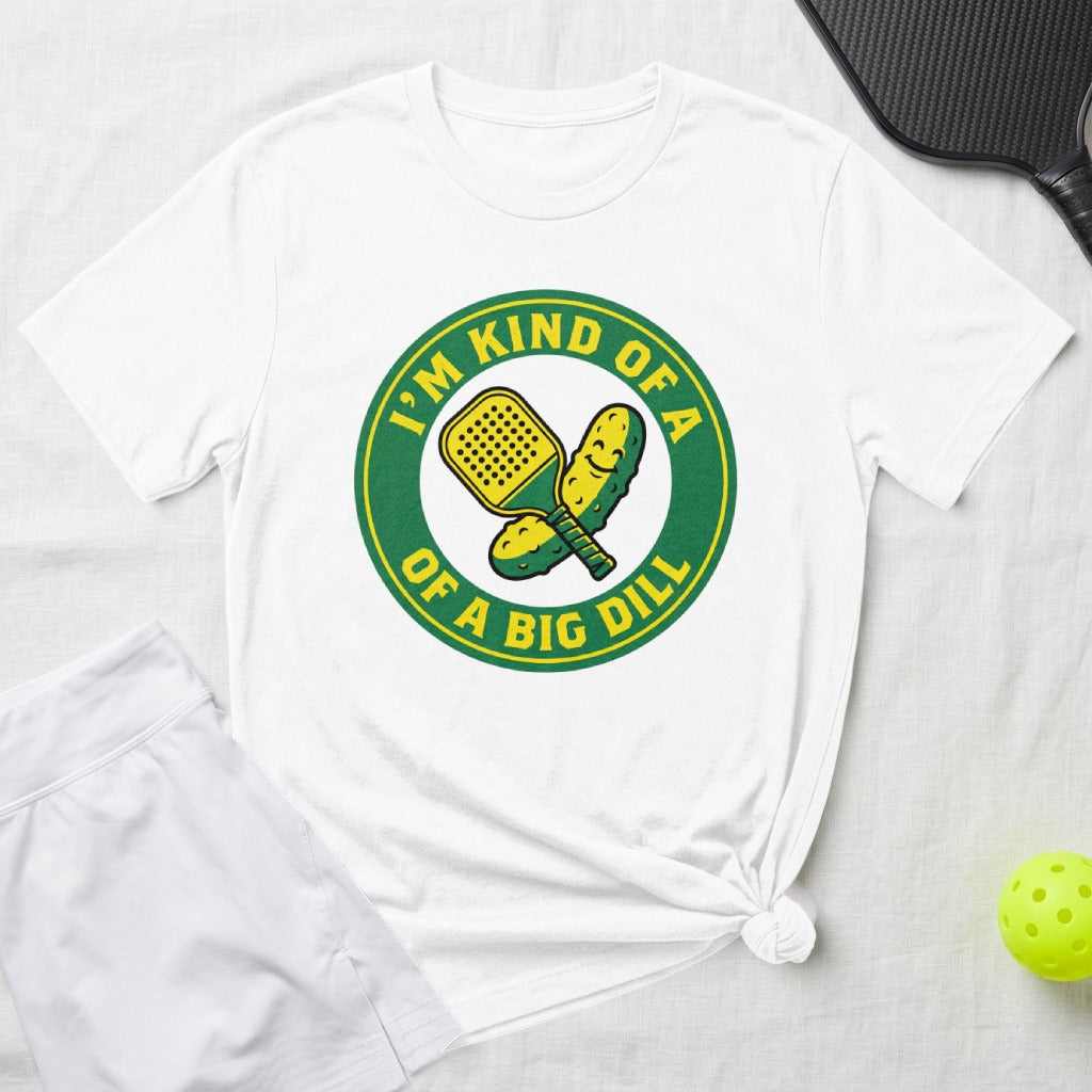 White t-shirt with a circular pickleball graphic saying "I'm kind of a big dill".
